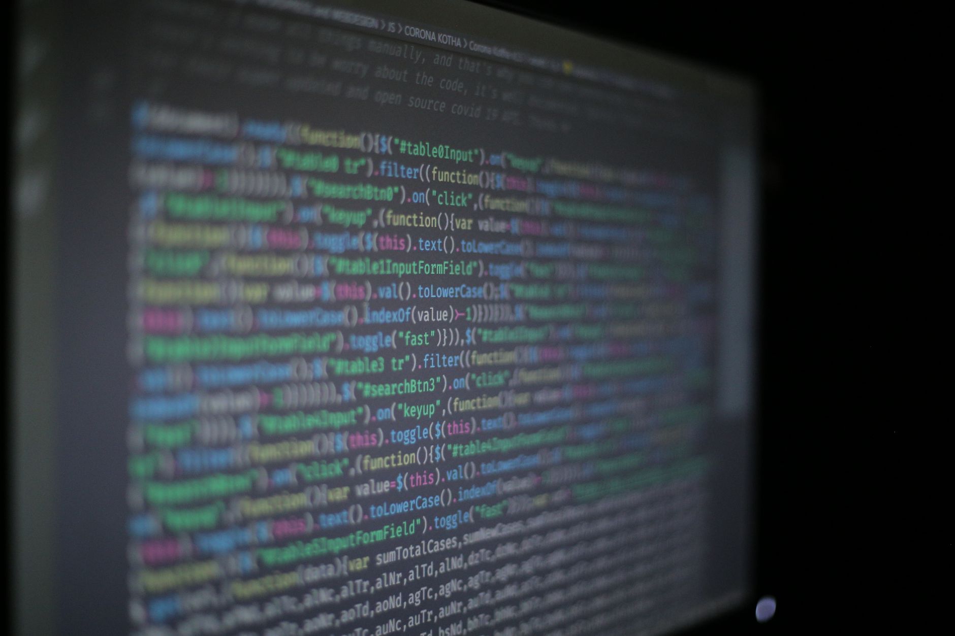 Developer coding custom software at desk